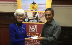 Nicola Mountain presenting a donation from the Zonta Club of Oamaru